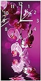 Wallario Design Wanduhr Rosafarbene Orchidee Blüten in pink aus Acrylglas, Größe 30 x 60 cm, weiße Zeiger