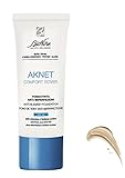 BioNike Aknet Komfort-Schutzhülle für Grundierung Nr. 101 Ivoire, Anti-Hautunreinheiten, verleiht ein leichtes, natürliches und angenehmes Ergebnis, 30 ml