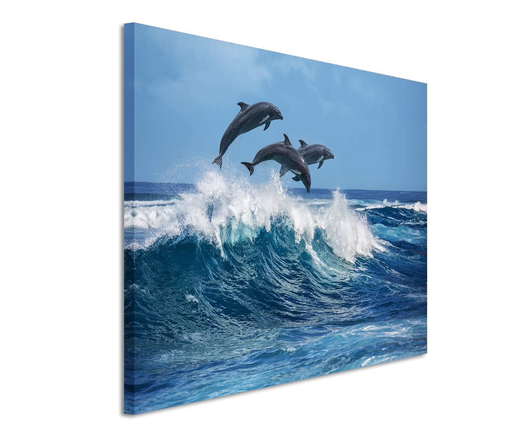Unique Fotoleinwand 120x80cm Tierbilder – DREI springende Delfine über Einer Meereswelle