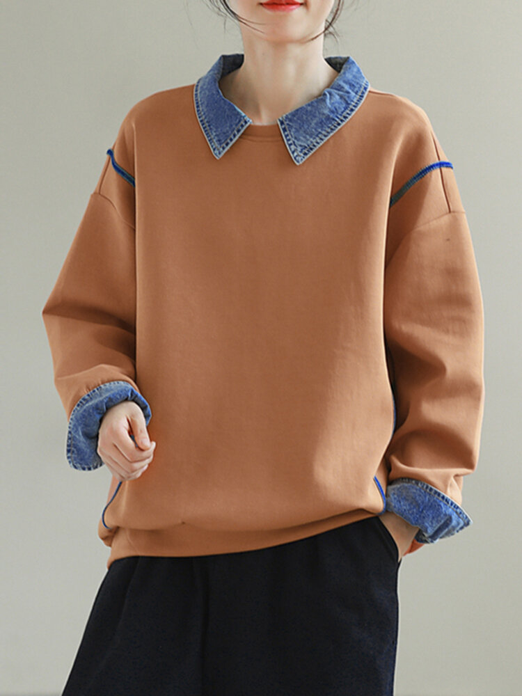 Lockeres Sweatshirt mit kontrastierendem Denim-Patchwork und Langarm-Revers