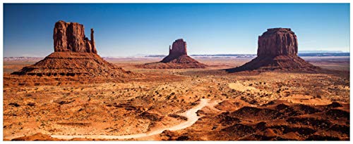 Wallario Glasbild Monument Valley unter blauem Himmel - 50 x 125 cm Wandbilder Glas in Premium-Qualität: Brillante Farben, freischwebende Optik