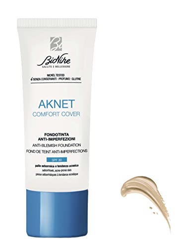 BioNike Aknet Komfort-Schutzhülle für Grundierung Nr. 101 Ivoire, Anti-Hautunreinheiten, verleiht ein leichtes, natürliches und angenehmes Ergebnis, 30 ml